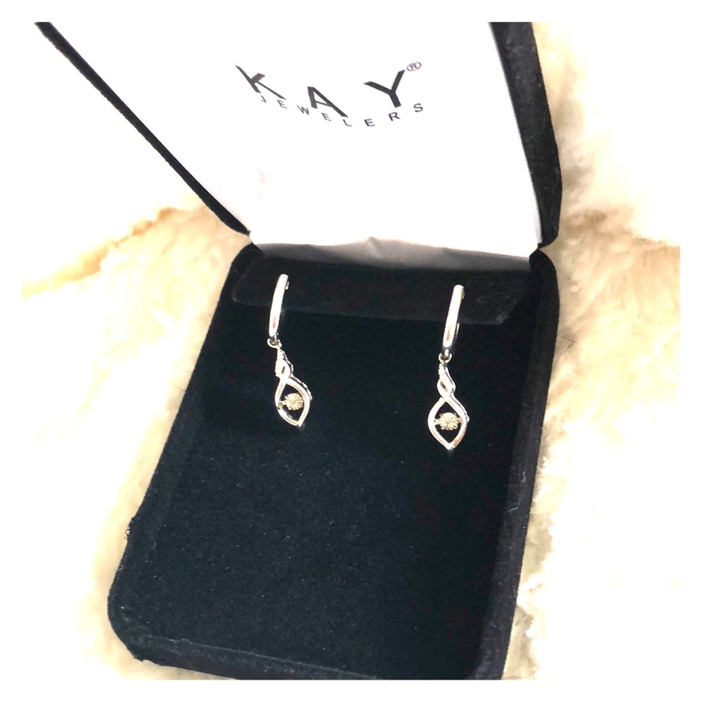 Real diamond earrings.
